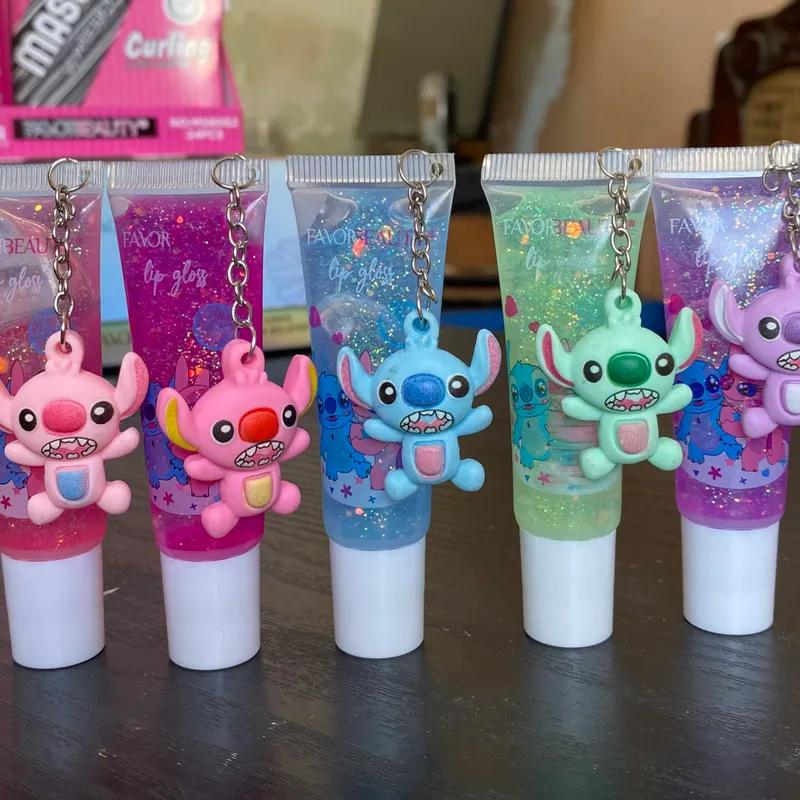 Brillo de labio con colgante de stich 