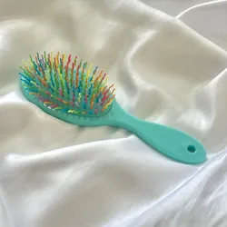 Cepillo masajeador para cabello