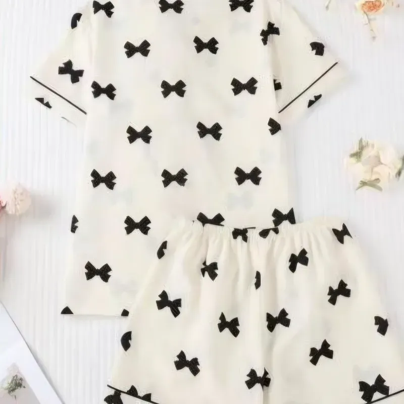 Set de pijama beige con lazos