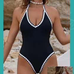 Truza enteriza negra con bordes blancos