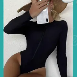 Truza negra de mangas largas