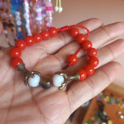 Pulsa de piedra natural (onix rojo y blanco)