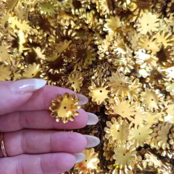 Flor lentejuelas doradas