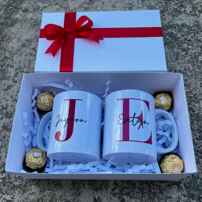 2 tazas + 1 caja de regalo