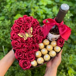 15 rosas eternas + 10 bombones Ferrero Rocher + 1 botella (whisky, vino, ron)