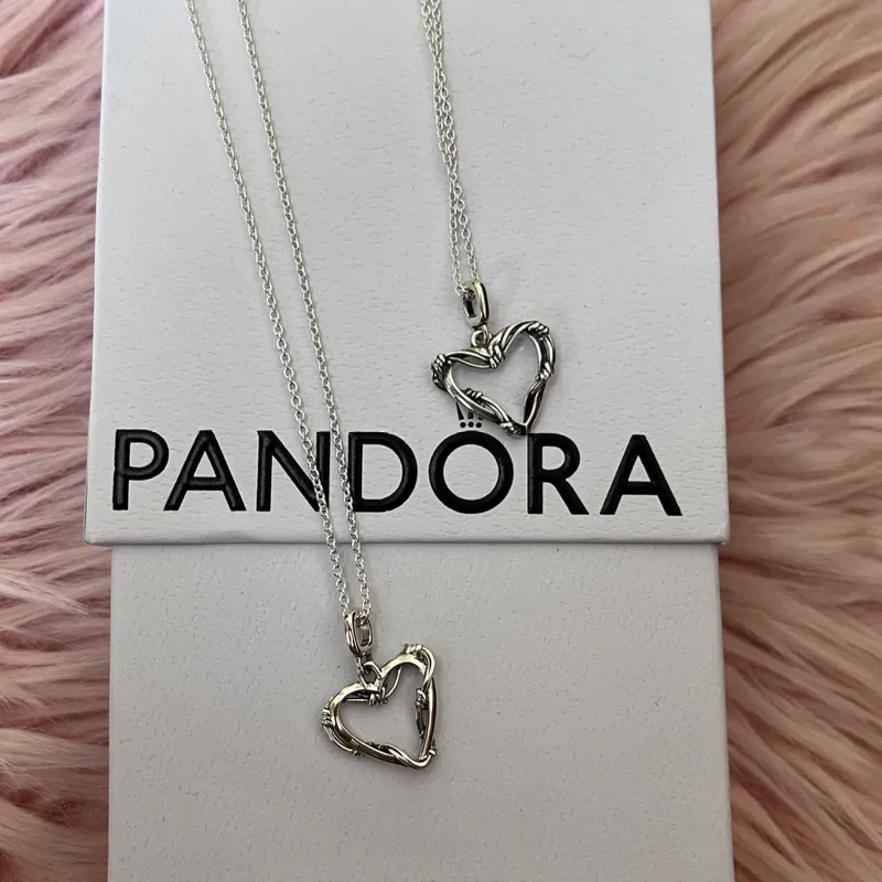 Cadena corazón Karol G 