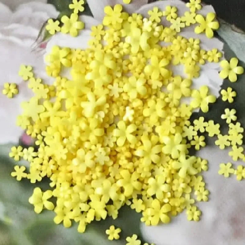 Flor de resina amarilla