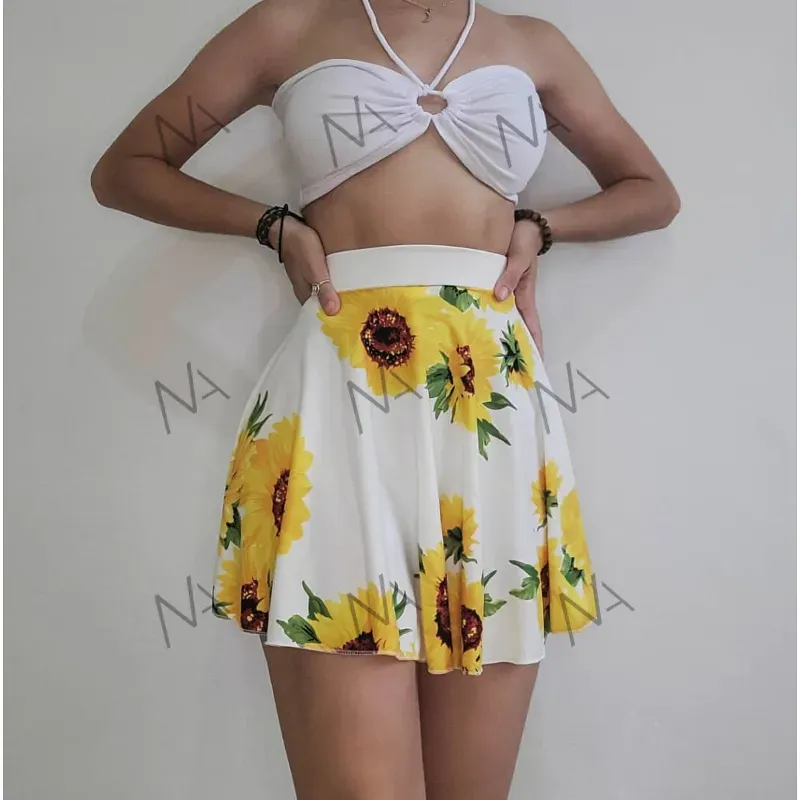 FALDA CIRCULAR DE GIRASOLES/TOP INFINITO BLANCO