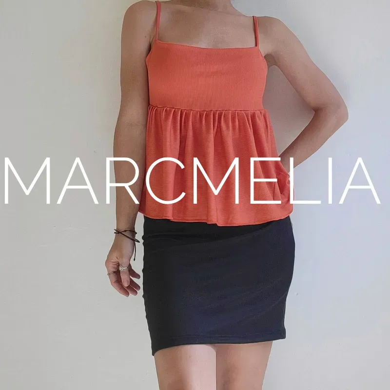 FALDA MINI NEGRA/TOP MUSA NARANJA