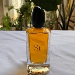 Si 