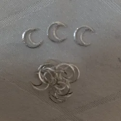 Estoperoles en forma de Luna