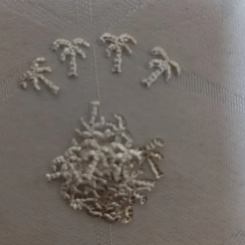 Estoperoles en forma de palmas