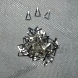 Estoperoles en forma de triángulo 