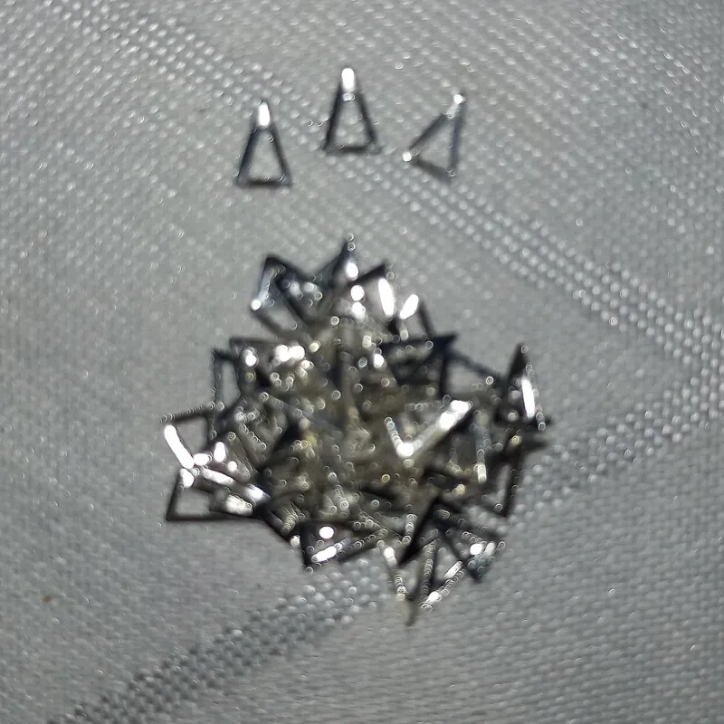 Estoperoles en forma de triángulo 