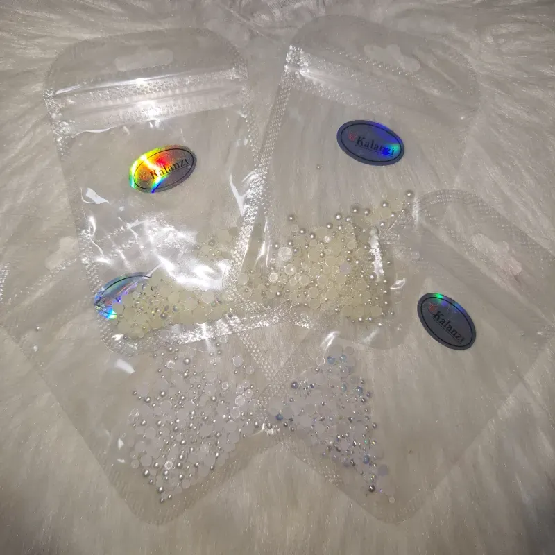 Medias perlas diferentes tamaños 