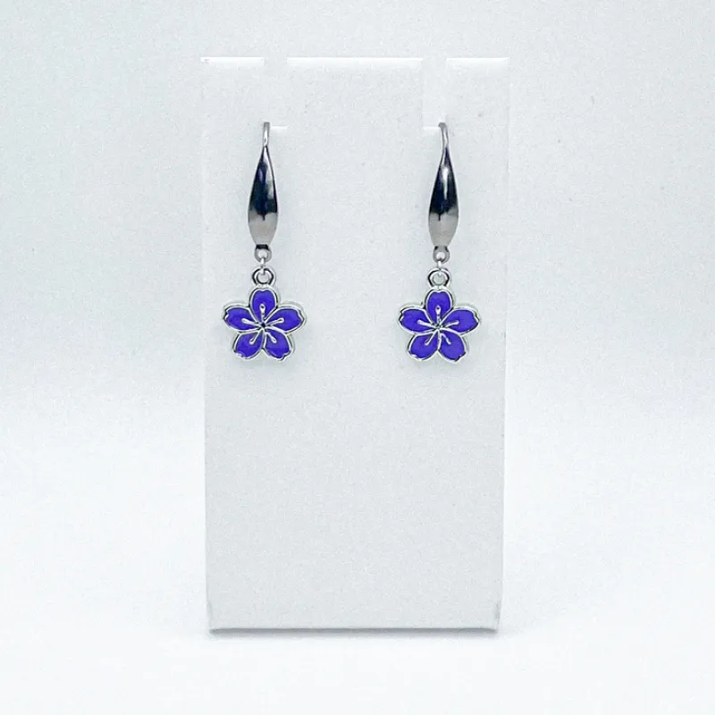 Aretes  con dijes y herrajes en baño de oro