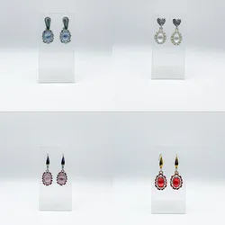Aretes tejidos con cuentas y cristales y piedra de ojo de gato ✨