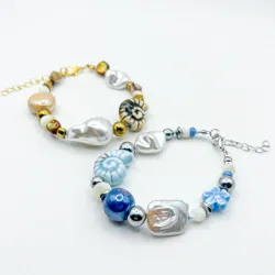 Pulsera de cerámica vidriada, perlas artificiales y hematitas