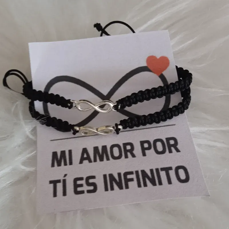 Pulsas con el signo del infinito 