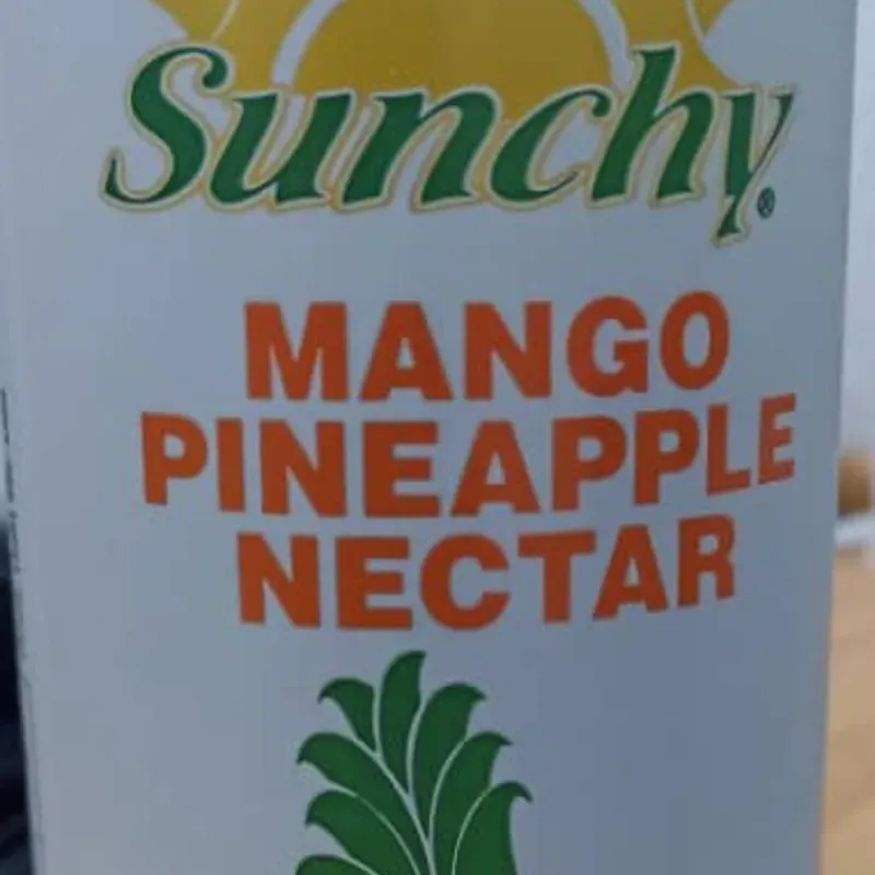 Jugo de lata mango - piña