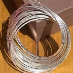 Juego de pulseras plateada