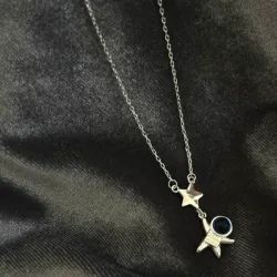 Cadena de astronauta con estrella