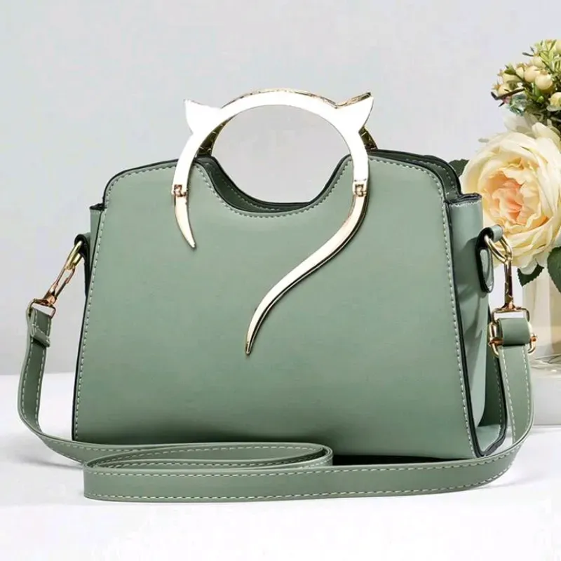 Bolso gatita dorada