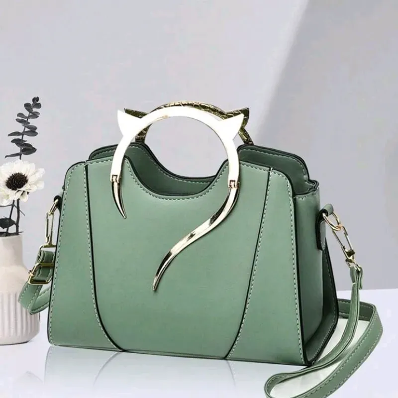 Bolso gatita dorada