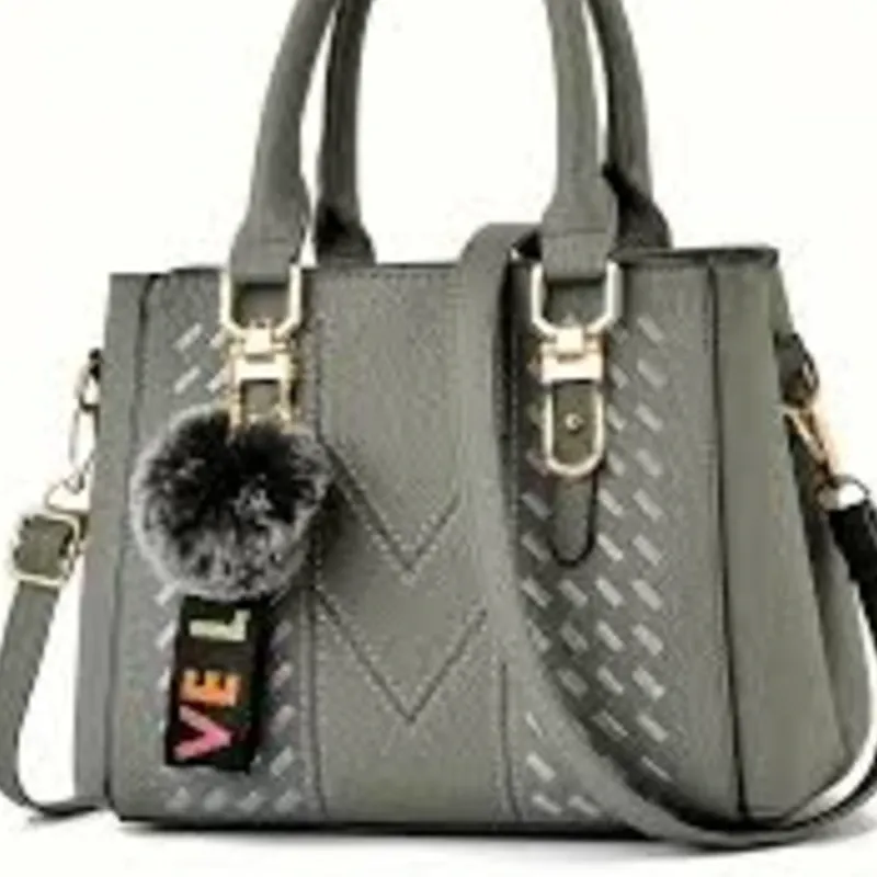 Bolso pom pom
