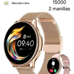 Reloj dorado doble manilla