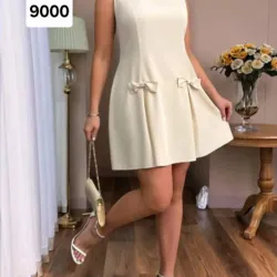 Vestido beige con lazos