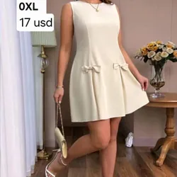 Vestido beige con lazos