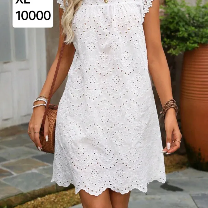 Vestido blanco de tira bordada