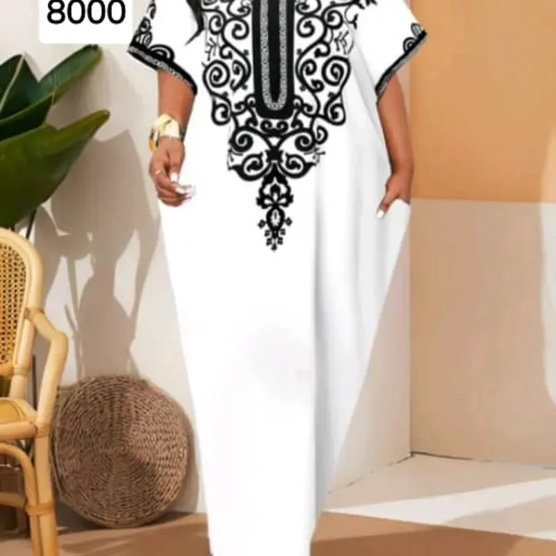 Vestido blanco largo con pinturas negras