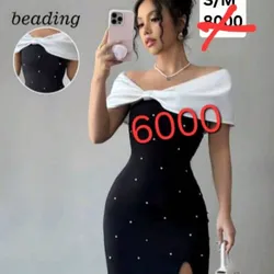 Vestido negro con hombros blancos