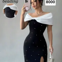 Vestido negro con hombros blancos