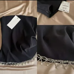 Tope de noche con brillo en los bordes marca Bershka