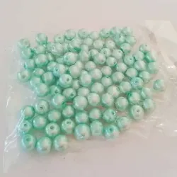 Paquete de 100 perlas.