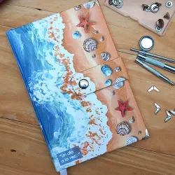 Diseño de playa con caracolas