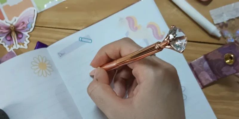 Bolígrafos de diamante y oro rosa