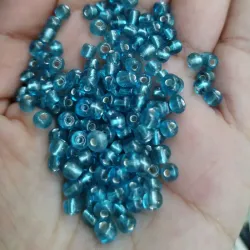 Shaquirón azul claro encapsulado 