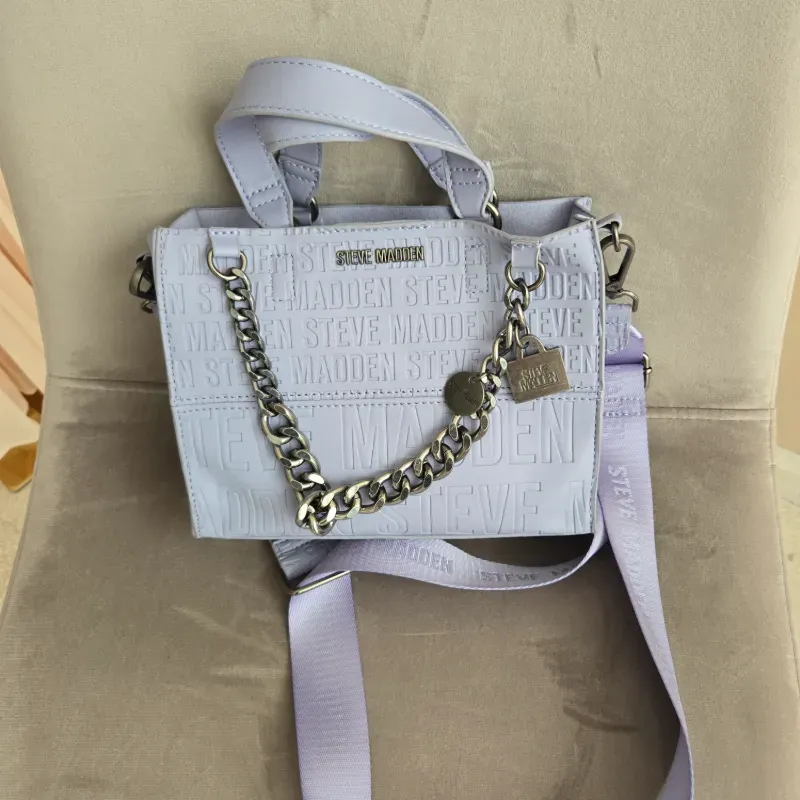 Cartera Steve Madden morada claro