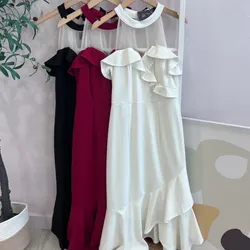 Vestido blanco con vuelos