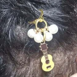 Colgante musical para trenzas