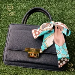Cartera azul oscura con lazo 🎀