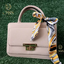 Cartera beige con lazo 🎀
