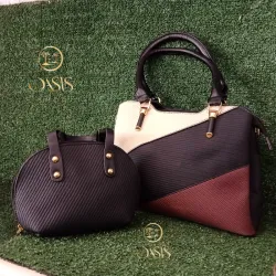 Cartera grande negra con detalles crema y rojo, cartera pequeña negra.