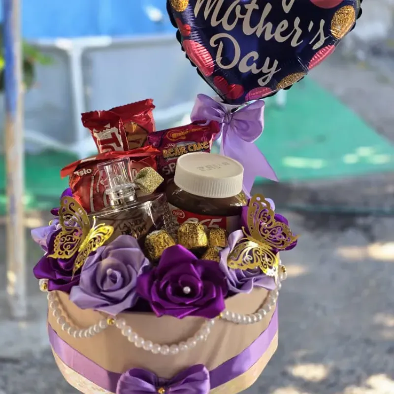 Caja redonda con perfume y Nutella 