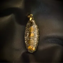 Orgonita óvalo ojo de tigre