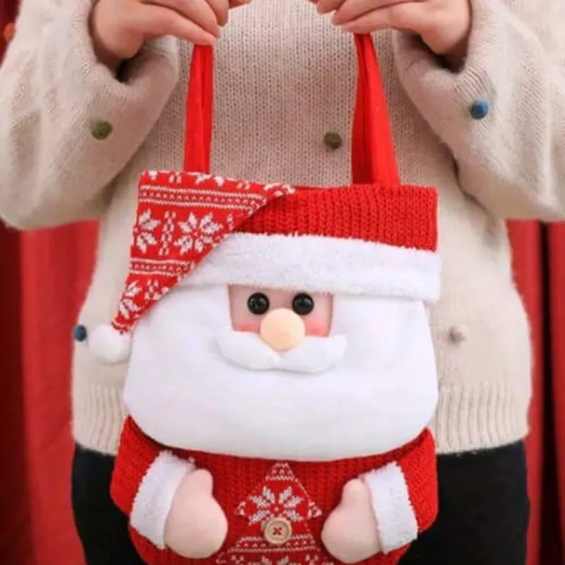 Bolsa navideña de santa clous con confituras y otros accesorios